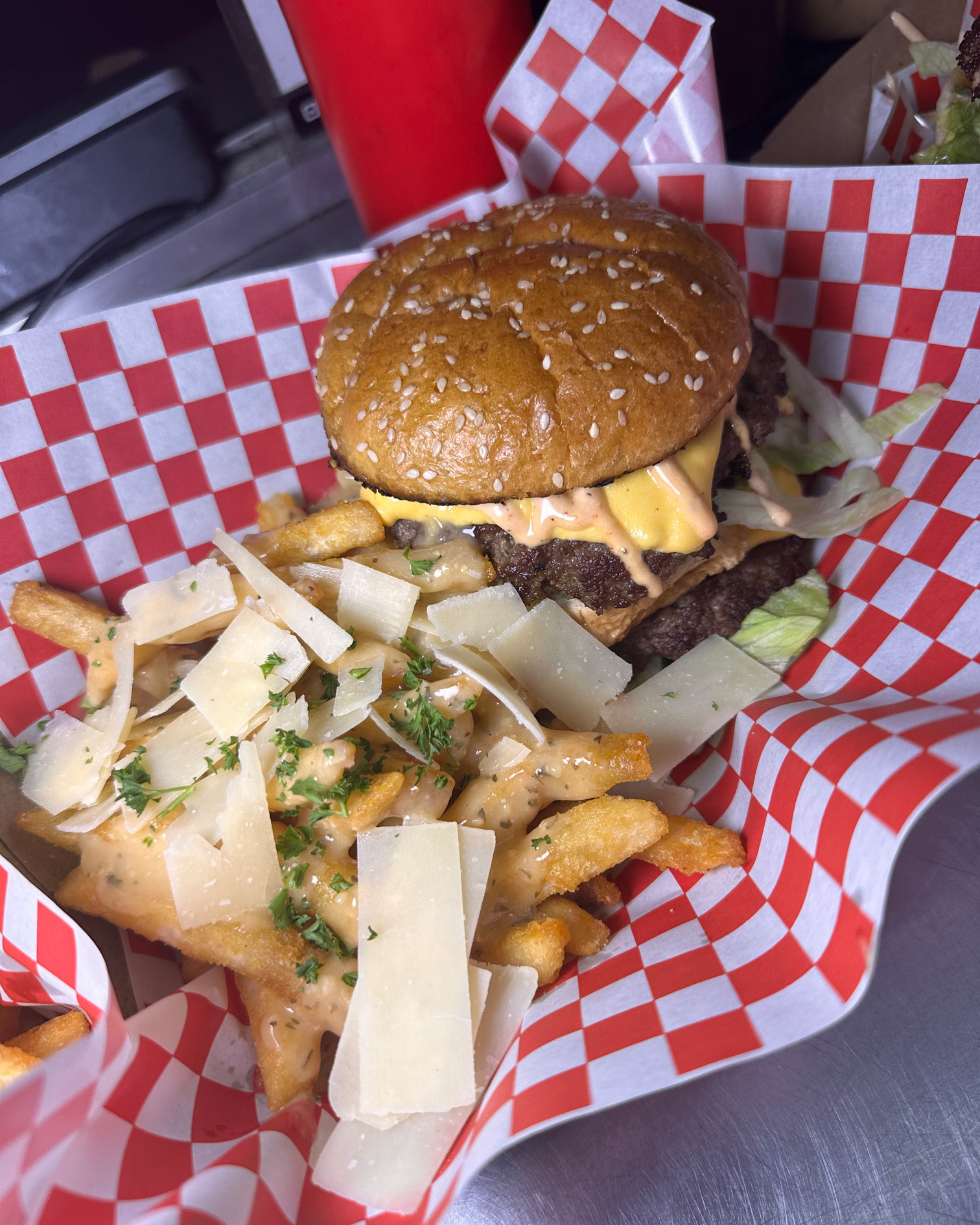 A Boy Named Sous smashburger and loaded fries, fresh off the truck